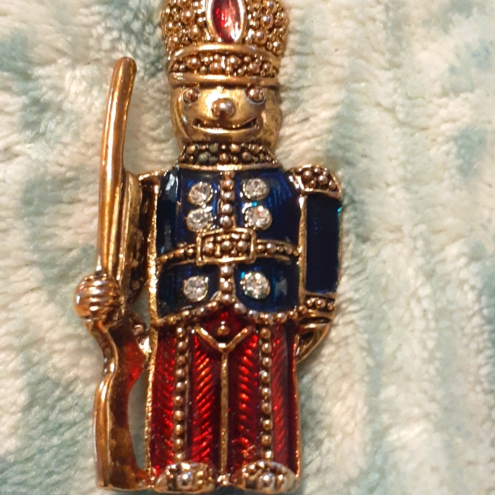 Antique toy soldier brooch